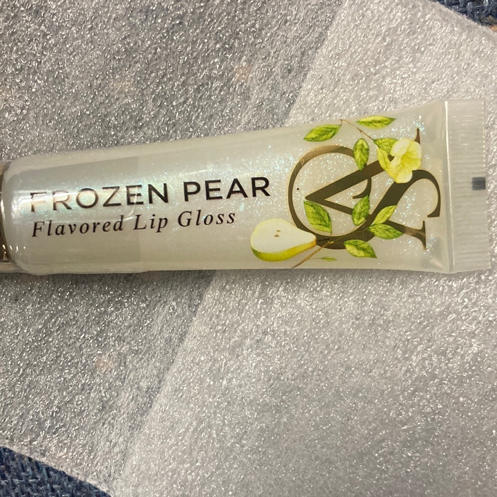 - - Victoria secret lip gloss BNWT! Flavored frozen pear!